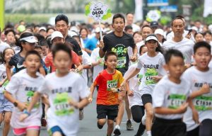 Parents and Children Take Part in Shanghai's Kids Run