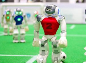 Humanoid Robots Play Football Game in Qingdao